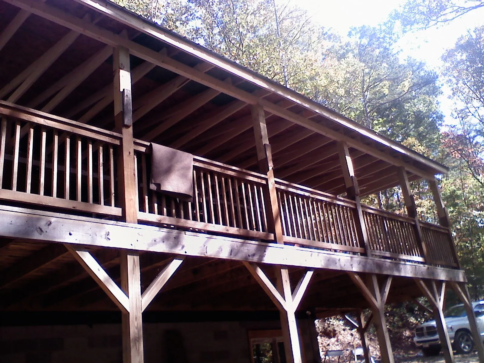 Timber framing under a new elevated porch and deck — Roof Leak Repair in Lometa by Roofing Brothers